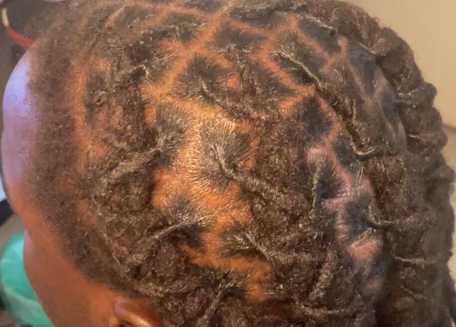 Detailed cornrow braids style at Twistsby.Glo in Fredrikstad, Østfold, NO. Perfect for showcasing elaborate hair designs.