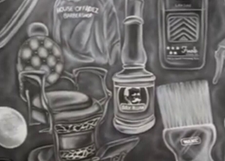 Artistic mural featuring barber tools at Yass_Fadez in Bexley, New South Wales, AU.