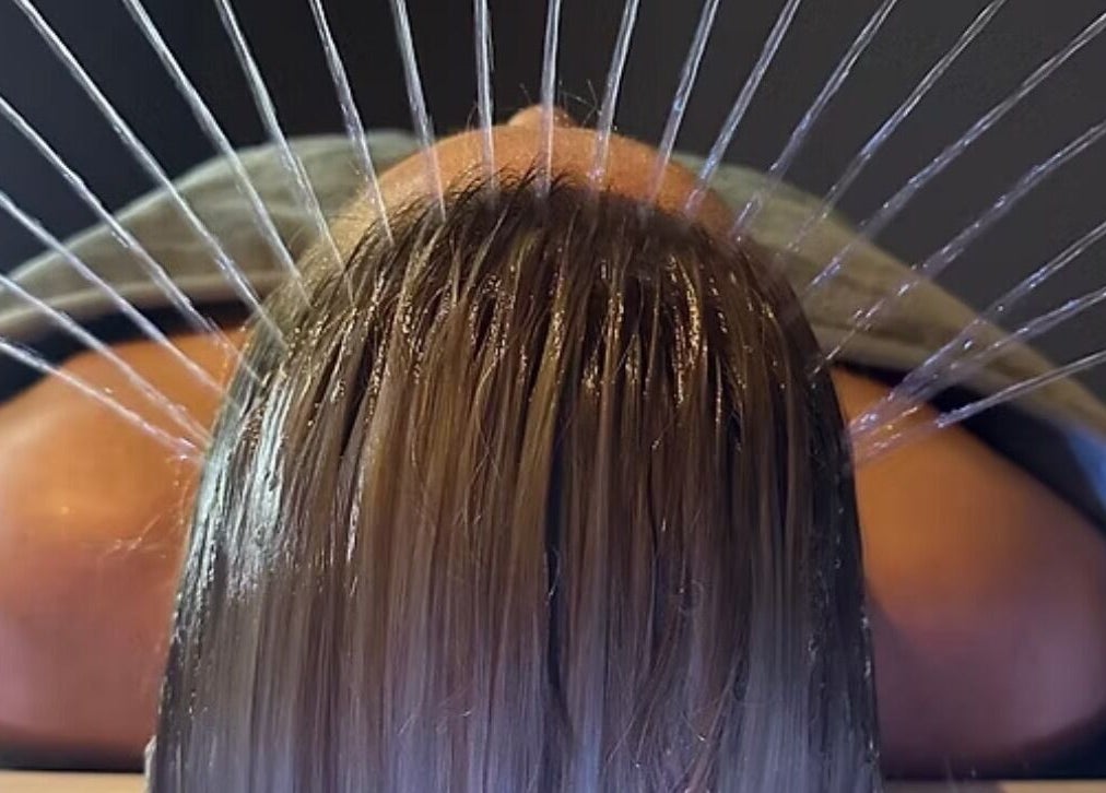 Relaxing hair wash at No. 4 Aesthetics & Beauty in St Albans, England, GB, featuring soothing water streams.