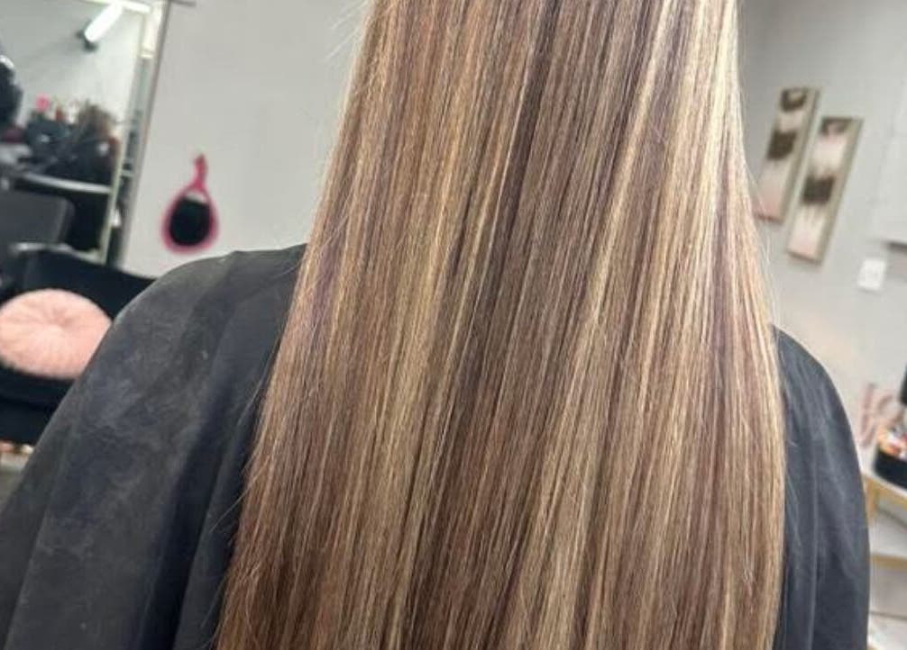 Long sleek hair extensions at Hair Extensions by Denise in Mission, Texas, US.