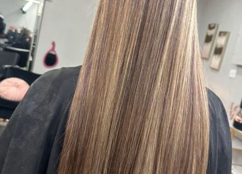 Long sleek hair extensions at Hair Extensions by Denise in Mission, Texas, US.