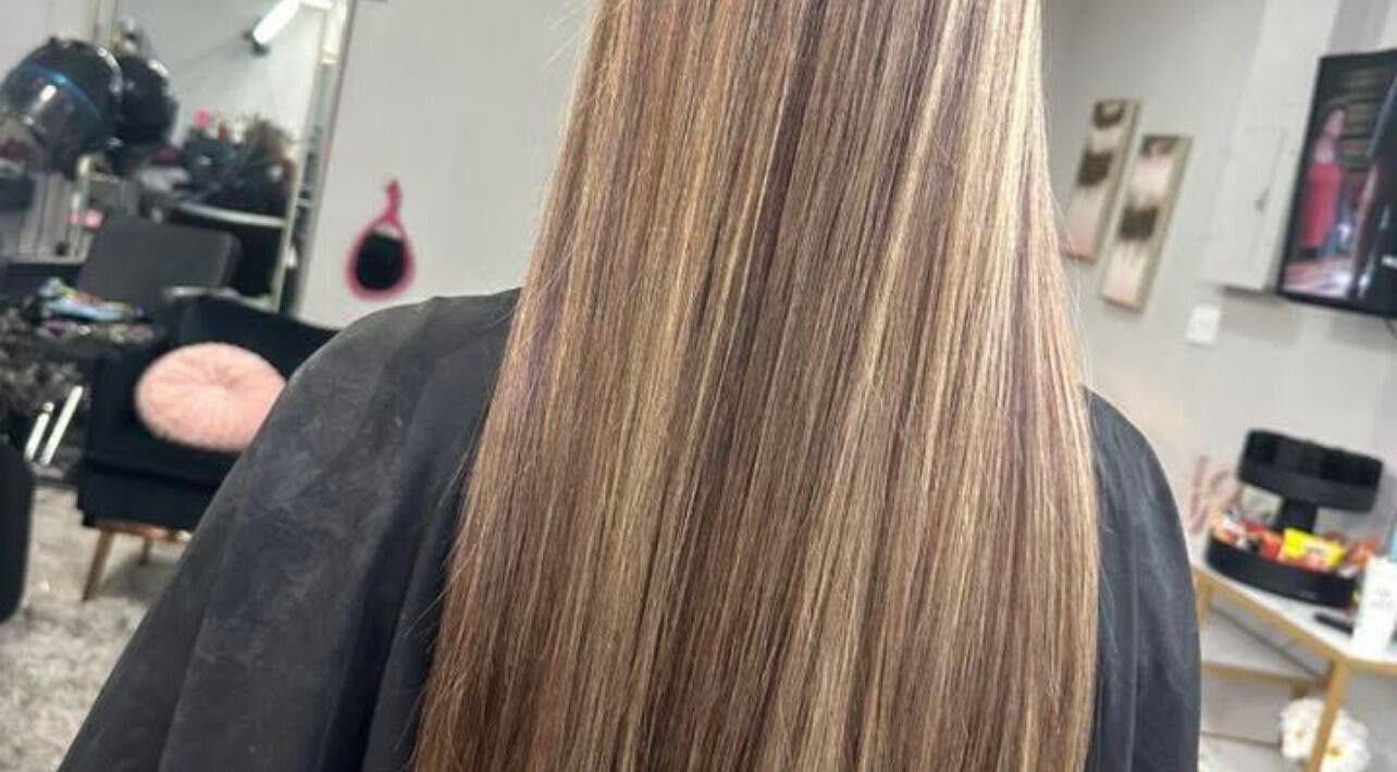 Long sleek hair extensions at Hair Extensions by Denise in Mission, Texas, US.