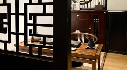 Traditional wooden room at Better Wellness TCM 養正理疗馆, Orchard, SG, exuding tranquility and elegance.