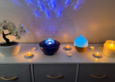 Serenity Lash & Brows in Farnham, England, GB offers a soothing setup with candles, diffuser, and decor.