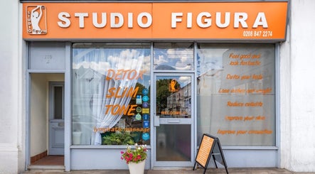 Front view of Studio Figura Ealing in London, England, GB, showcasing vibrant signage and welcoming entrance.