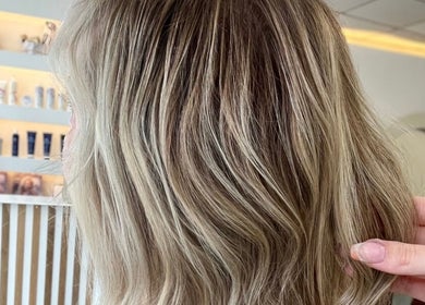 Stylish blonde hair waves styled at Hair By Chloe, Barnstaple, England, GB salon.