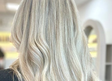 Blonde hair styled elegantly at Hair By Chloe, Barnstaple, England, GB, showcasing professional beauty techniques.