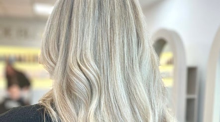 Blonde hair styled elegantly at Hair By Chloe, Barnstaple, England, GB, showcasing professional beauty techniques.