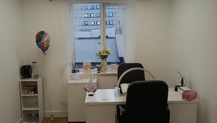 Elegant nail salon interior at Nails by Liv, Cheadle Hulme, England, GB with a stylish manicure station.