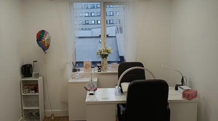 Elegant nail salon interior at Nails by Liv, Cheadle Hulme, England, GB with a stylish manicure station.