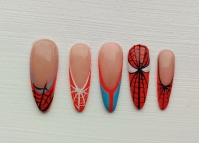 Spiderman-themed nail art at Nails by Liv, Cheadle Hulme, England, GB, showcasing red and web designs.