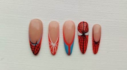 Spiderman-themed nail art at Nails by Liv, Cheadle Hulme, England, GB, showcasing red and web designs.