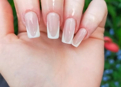 Elegant nail art at Nails by Liv, Cheadle Hulme, England, GB. Featuring classic French tips for a chic look.