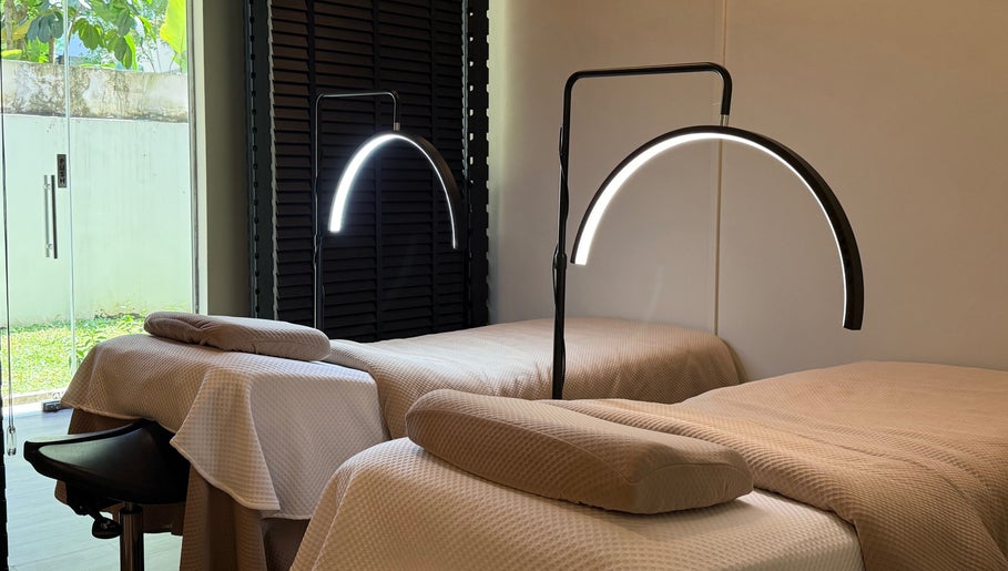 Calming wellness room at The Lash Crew, Marine Parade, SG with cozy beds and ambient lighting.
