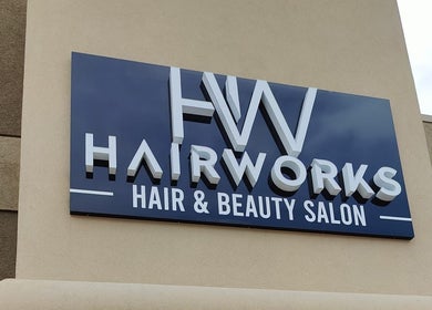 Exterior sign of Hairworks Salon Windsor located in Lasalle, Ontario, CA.
