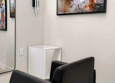 Modern salon chair with abstract art, Hairworks Salon Windsor, Lasalle, Ontario, CA. Contemporary style decor.