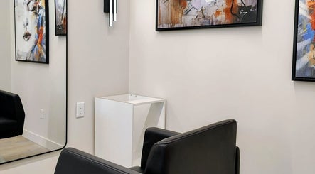 Modern salon chair with abstract art, Hairworks Salon Windsor, Lasalle, Ontario, CA. Contemporary style decor.