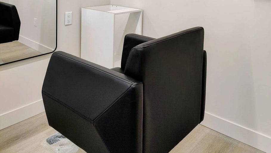 Elegant salon chair at Hairworks Salon Windsor, Lasalle, Ontario, CA, showcasing a stylish and welcoming space.