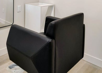 Elegant salon chair at Hairworks Salon Windsor, Lasalle, Ontario, CA, showcasing a stylish and welcoming space.