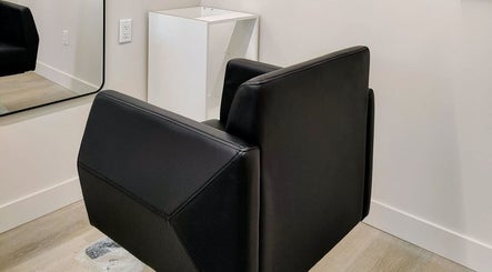 Elegant salon chair at Hairworks Salon Windsor, Lasalle, Ontario, CA, showcasing a stylish and welcoming space.