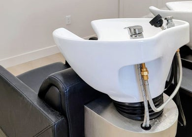Sleek salon wash station at Hairworks Salon Windsor, Lasalle, Ontario, CA. Modern and inviting hair care setting.