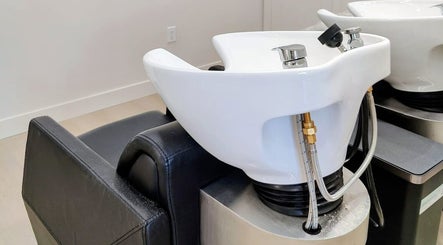 Sleek salon wash station at Hairworks Salon Windsor, Lasalle, Ontario, CA. Modern and inviting hair care setting.
