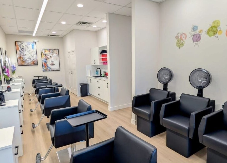 Modern styling chairs at Hairworks Salon Windsor in Lasalle, Ontario, CA showcasing a sleek, inviting interior.