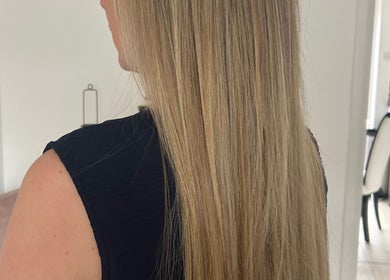 Long, silky blonde hair at The Extension Room by Ellie in Waterlooville, England, GB, showcasing salon results.