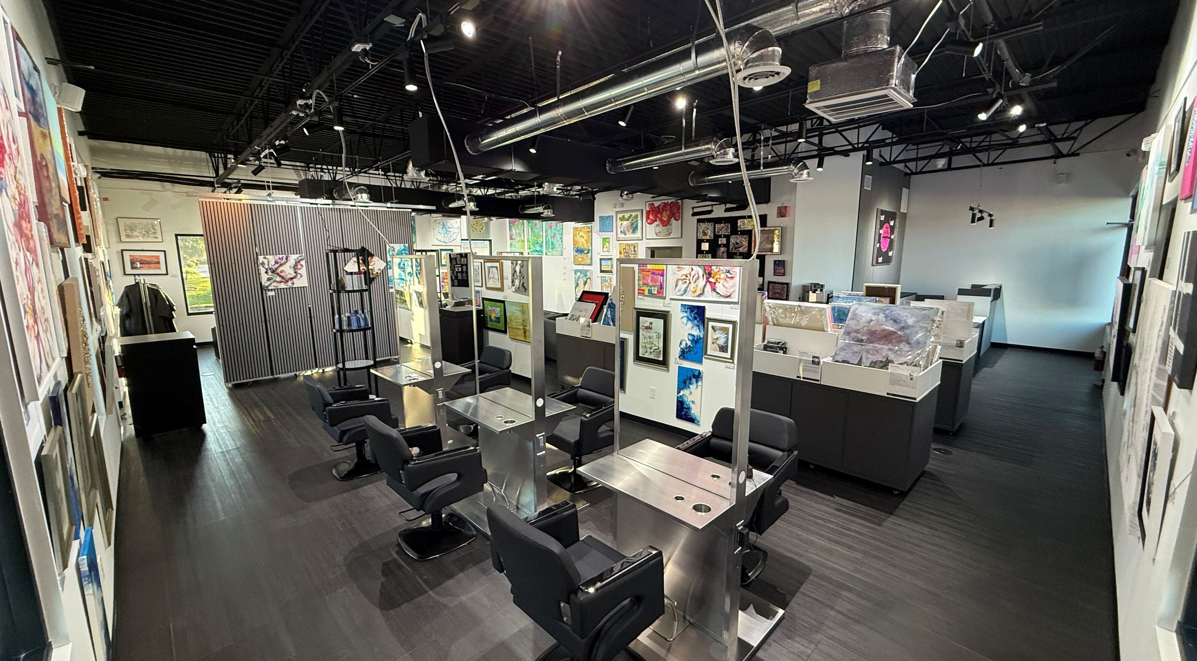 Modern salon interior with art at hairt - Professional Hair Salon & Art Gallery, Cape Coral, Florida, US.