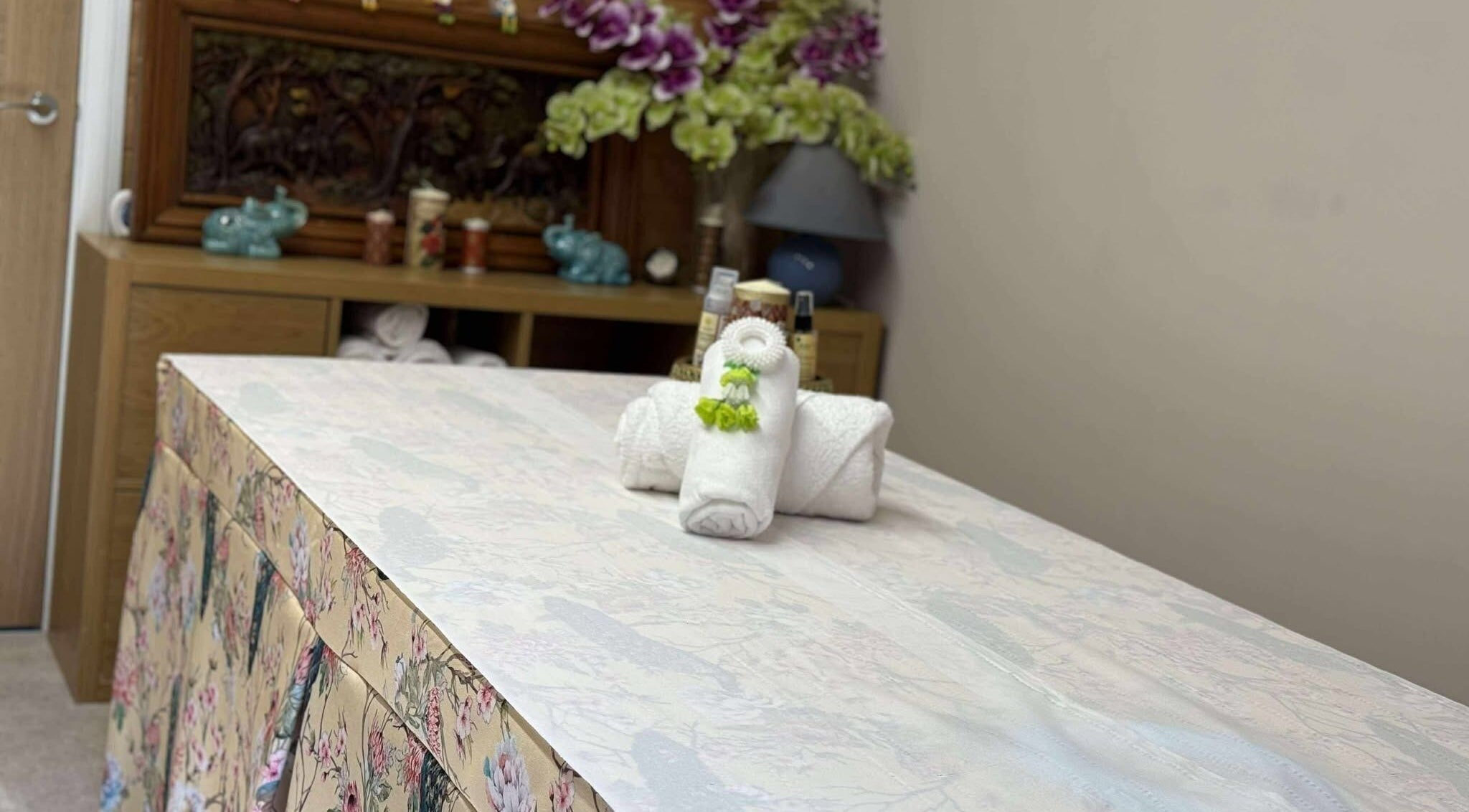 Relaxing massage table setup at Oak Barn Thai Massage in Lingfield, Newchapel, England, GB.