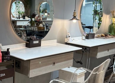 Stylish mirror and product display at Gina Conway Beauty, London, England, GB offering premium salon services.