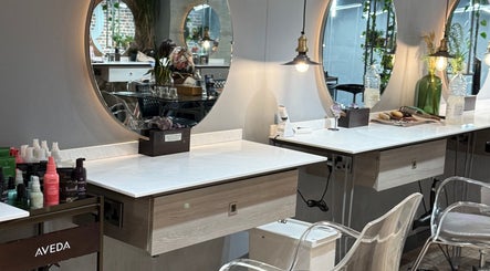 Stylish mirror and product display at Gina Conway Beauty, London, England, GB offering premium salon services.