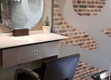 Contemporary beauty station at Gina Conway Beauty, London, England, GB, featuring sleek design and natural elements.