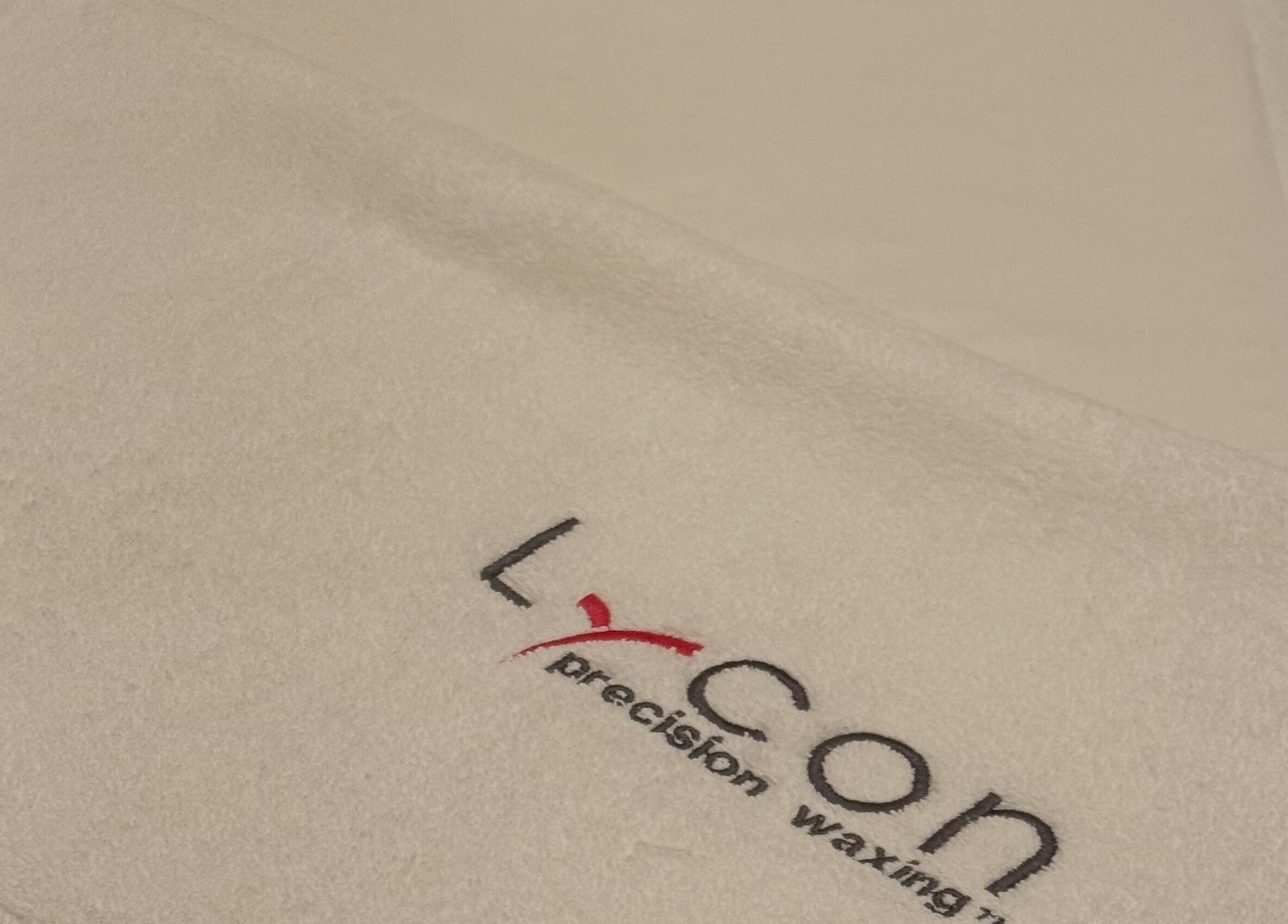Lycon branded towel on treatment bed at 107 Putney high street SW15 1SS, London, England, GB.