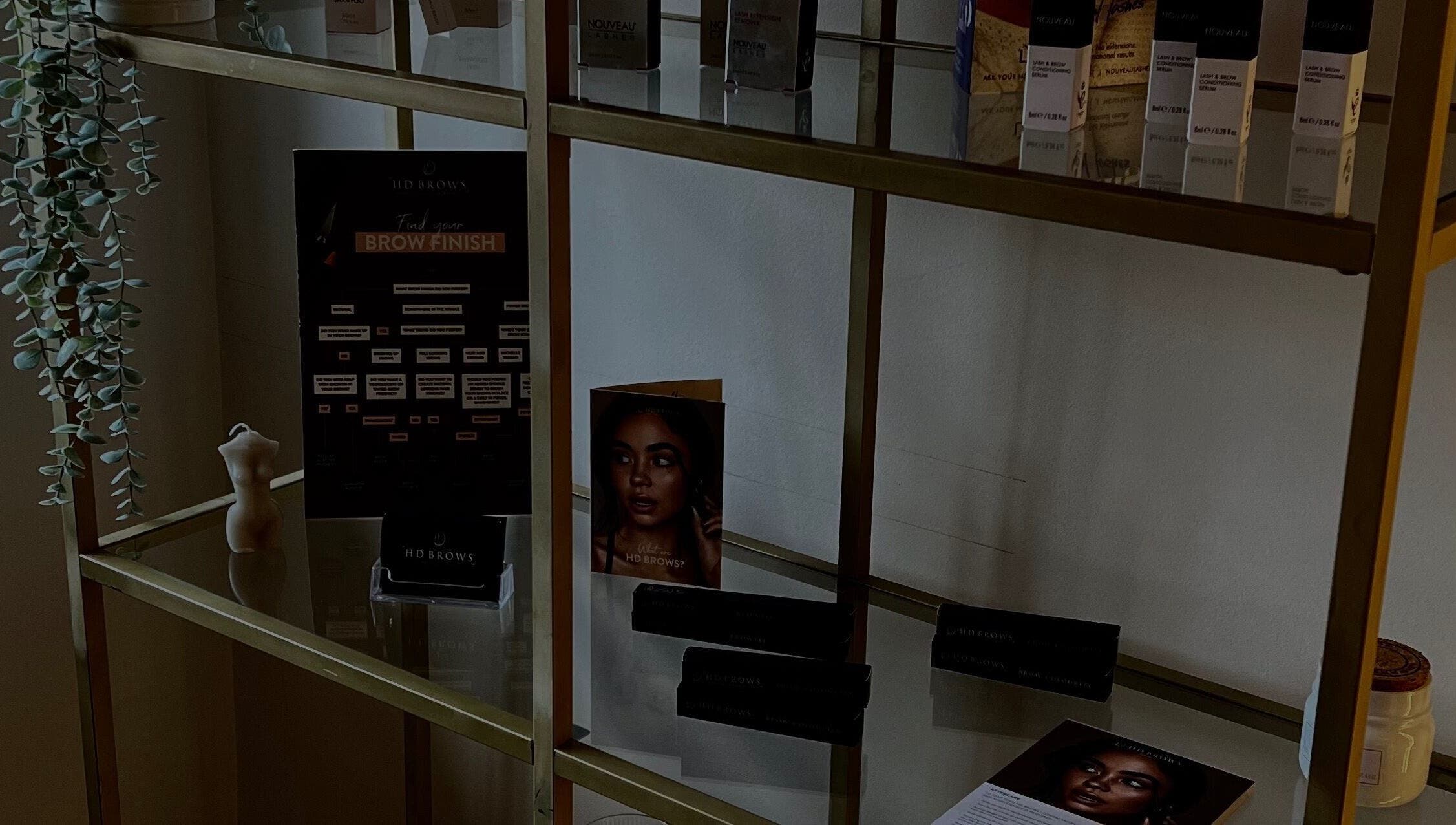 Elegant product display shelf at Lashes, Maidstone, England, GB featuring beauty essentials.