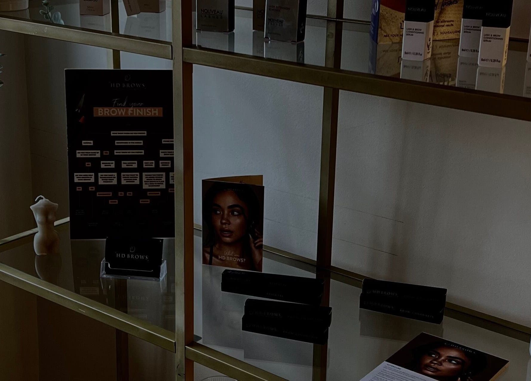 Elegant product display shelf at Lashes, Maidstone, England, GB featuring beauty essentials.