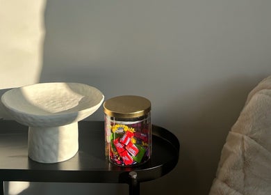 Elegant decor at De Luxe Beaute, Nottingham, England, GB, featuring a stylish bowl and candy jar on a black table.