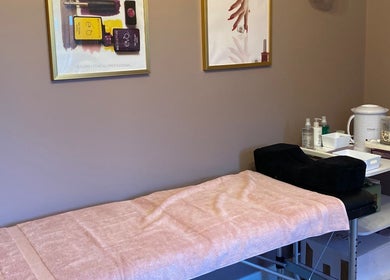 A cozy treatment room at Nu Nails And Beauty in Hemel Hempstead, England, GB, showcasing a comfortable massage table.