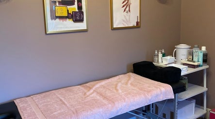 A cozy treatment room at Nu Nails And Beauty in Hemel Hempstead, England, GB, showcasing a comfortable massage table.