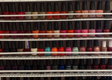Wide array of nail polish at Nu Nails And Beauty, Hemel Hempstead, England, GB, showcasing vibrant nail colors.