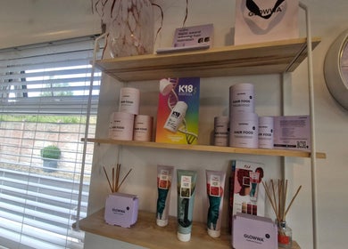 Product display at Hairbyanna, Limerick, County Clare, IE, featuring Glowwa hair care items on shelf.