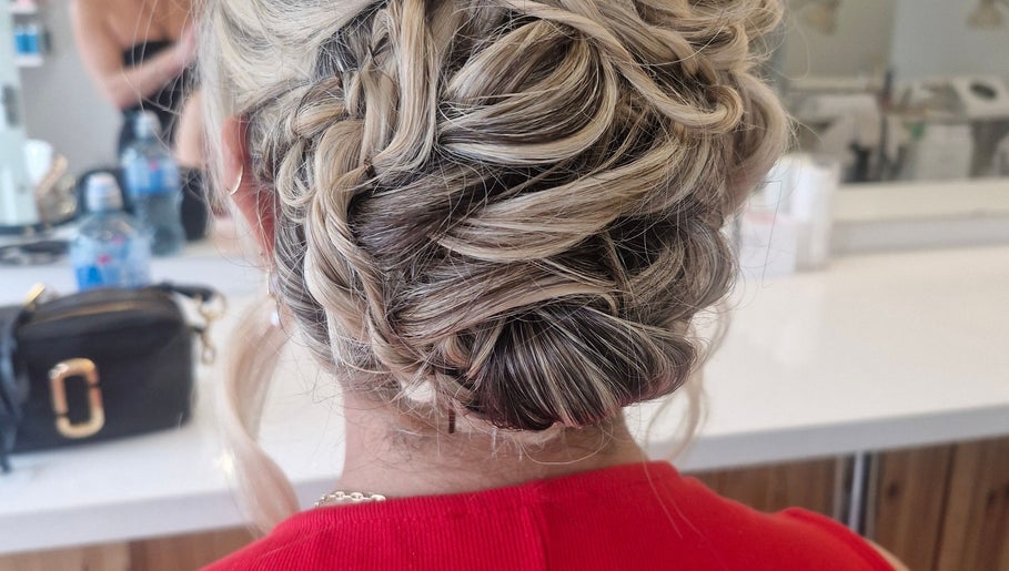 Intricate braided updo hairstyle at Hairbyanna in Limerick, County Clare, IE, showcasing elegance and style.