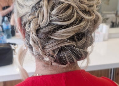 Intricate braided updo hairstyle at Hairbyanna in Limerick, County Clare, IE, showcasing elegance and style.