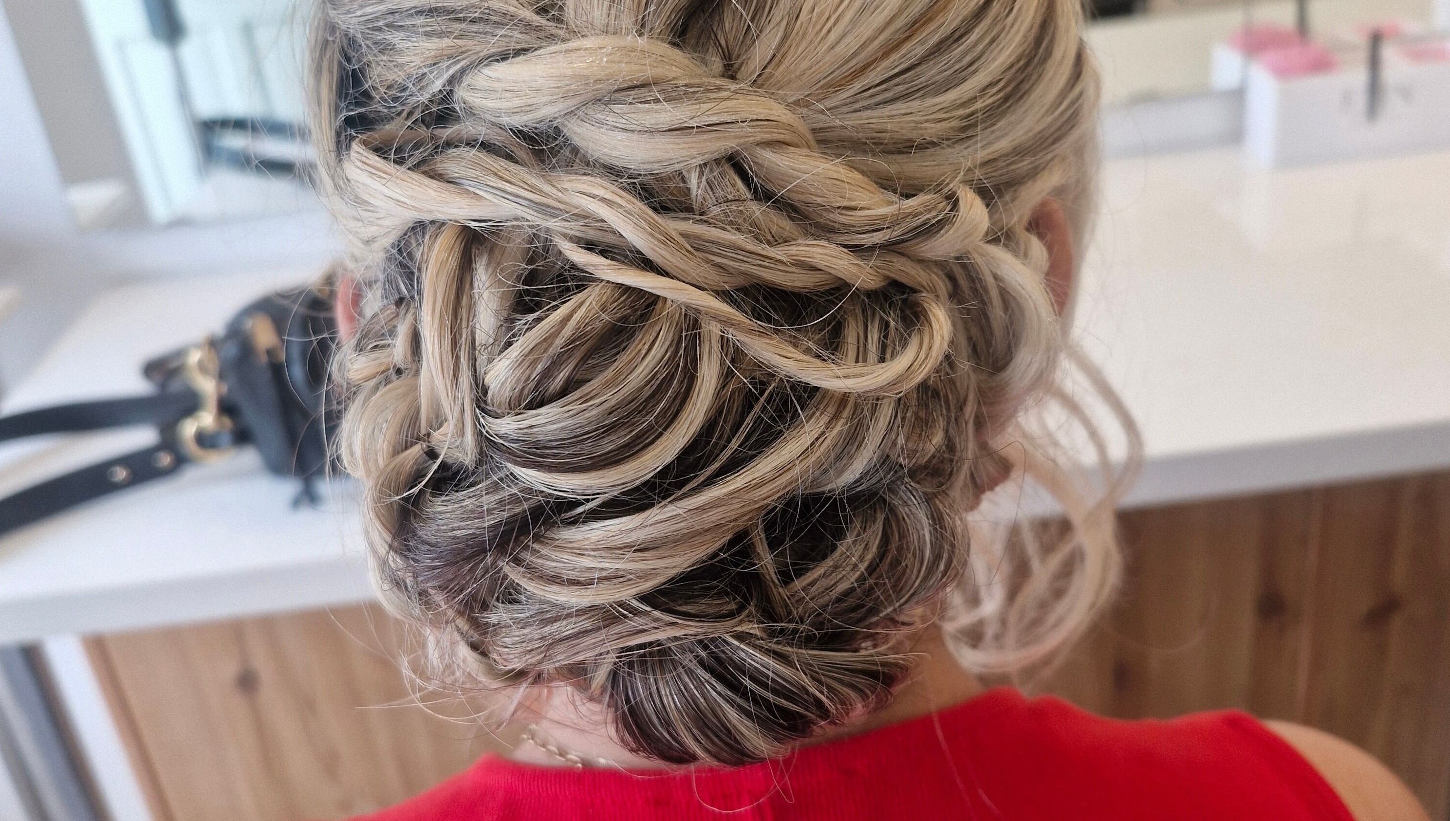 Intricate braided updo hairstyle by HairbyAnna, County Clare, County Clare, IE, showcasing expert styling.