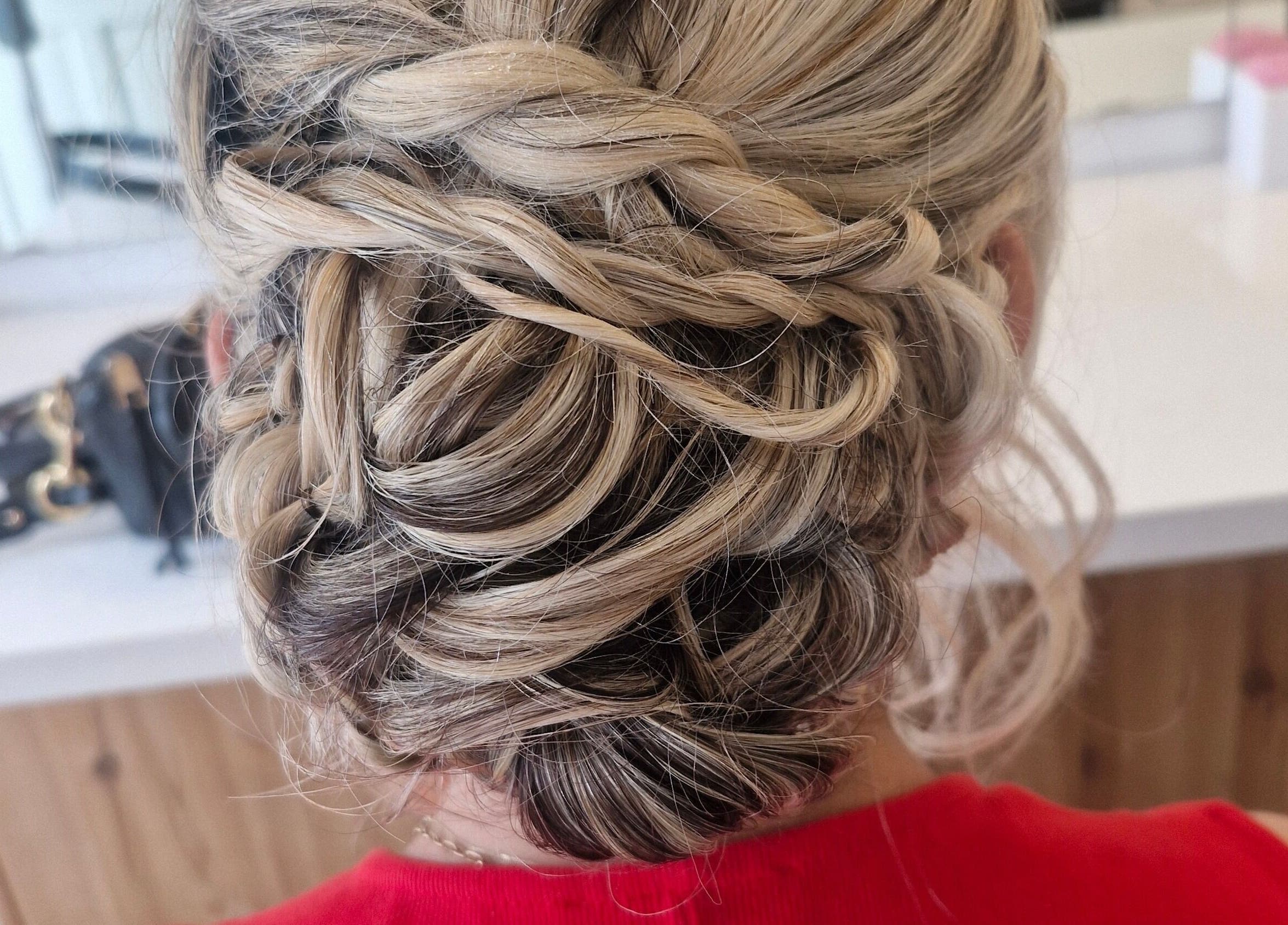 Intricate braided updo hairstyle by HairbyAnna, County Clare, County Clare, IE, showcasing expert styling.
