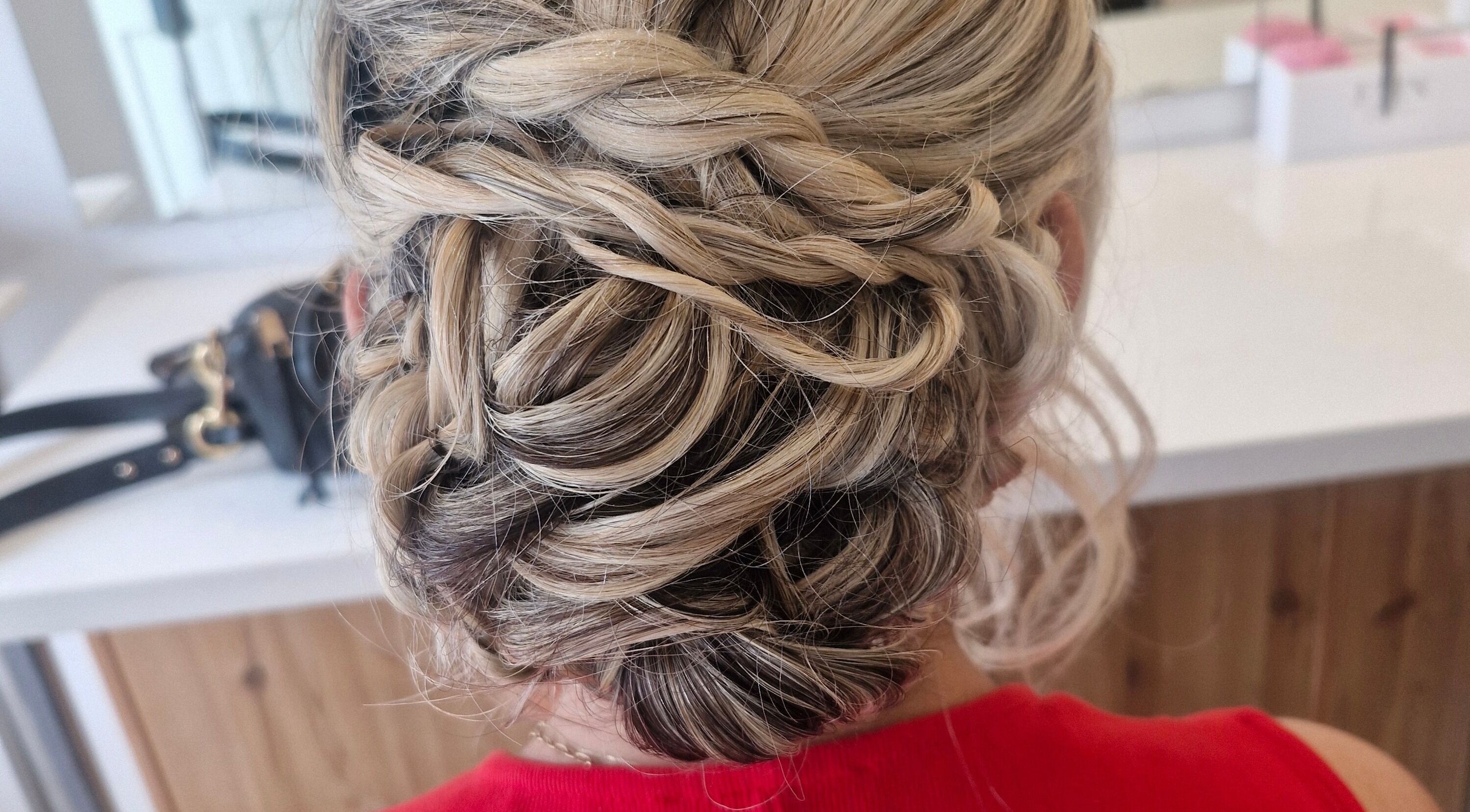 Intricate braided updo hairstyle by HairbyAnna, County Clare, County Clare, IE, showcasing expert styling.