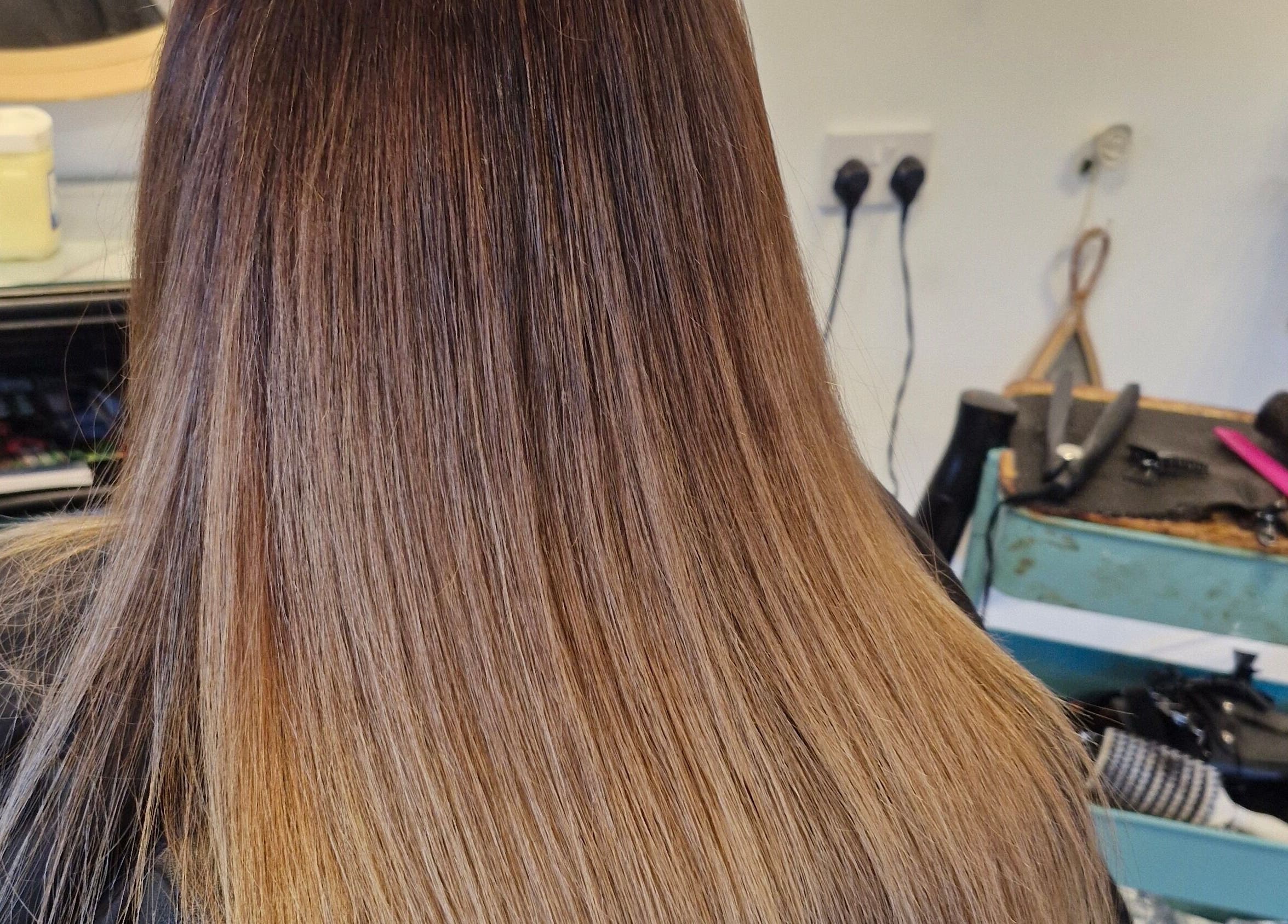 Smooth, styled brown hair at HairbyAnna in County Clare, County Clare, IE salon.