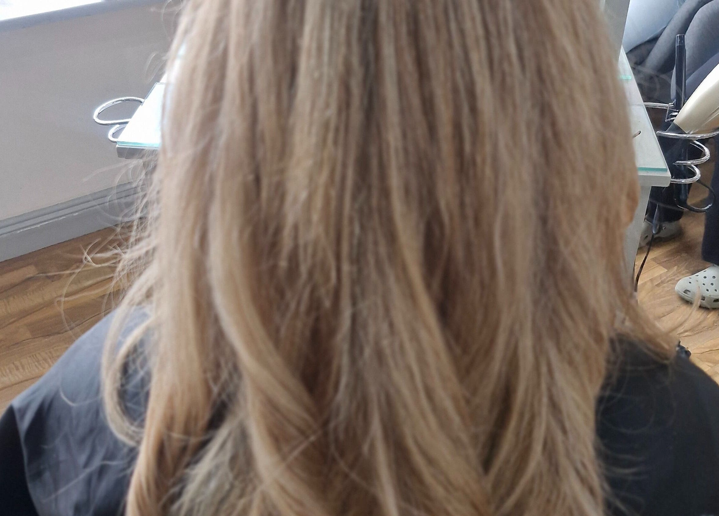 Back view of blonde hair styling at HairbyAnna salon, County Clare, County Clare, IE.