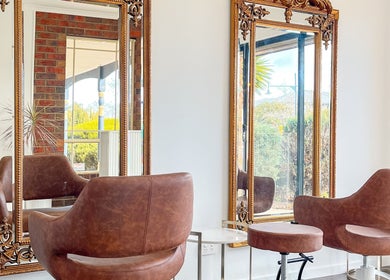 Luxurious salon chairs and ornate mirrors at Renz Hair Studio, Melbourne, Victoria, AU.