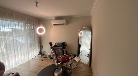Cozy barber chair setup at B The Barber, Perth, Western Australia, AU, featuring modern studio lighting.